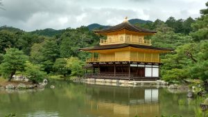 Kinkaku-ji, a temple in Kyoto completely covered in gold leaf.