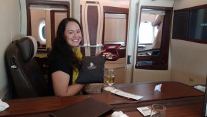 The first class suite on Singapore Airlines. Greeted with champaign and gifts upon boarding.